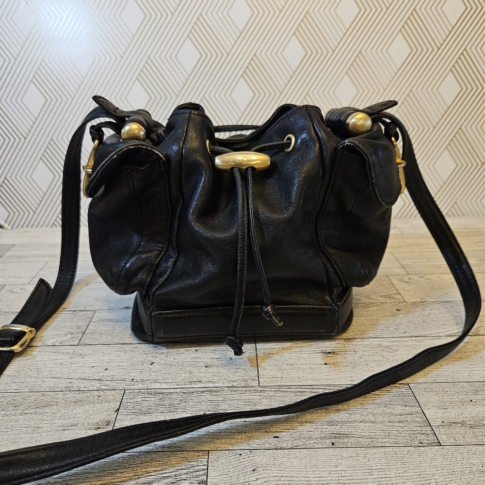 Sabina Black Leather Drawstring Shoulder Bag with Gold Accents